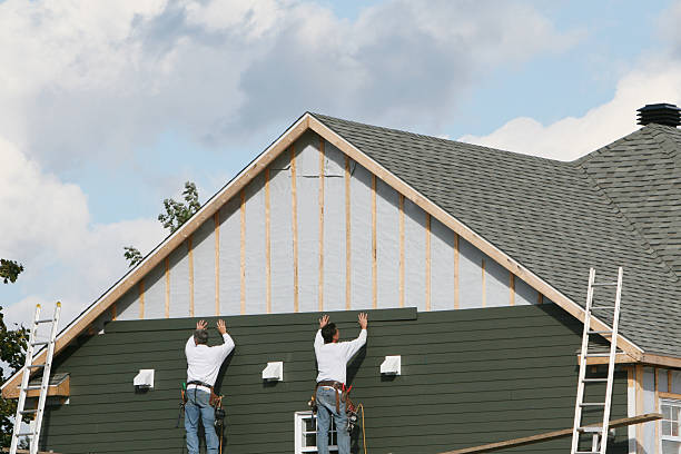 Professional Siding Installation technician working in Central, TN